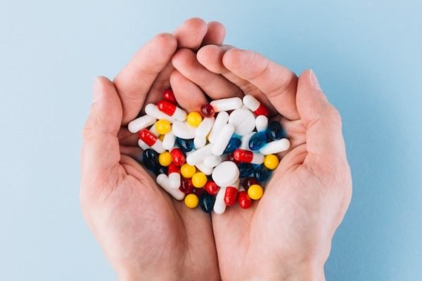 various-pills-hand_23-2147983107